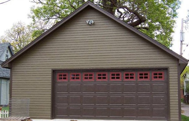A two car garage with extra space on the left side