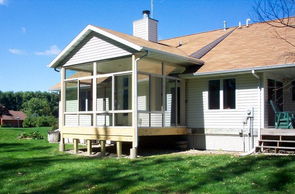 A screened in porch being built