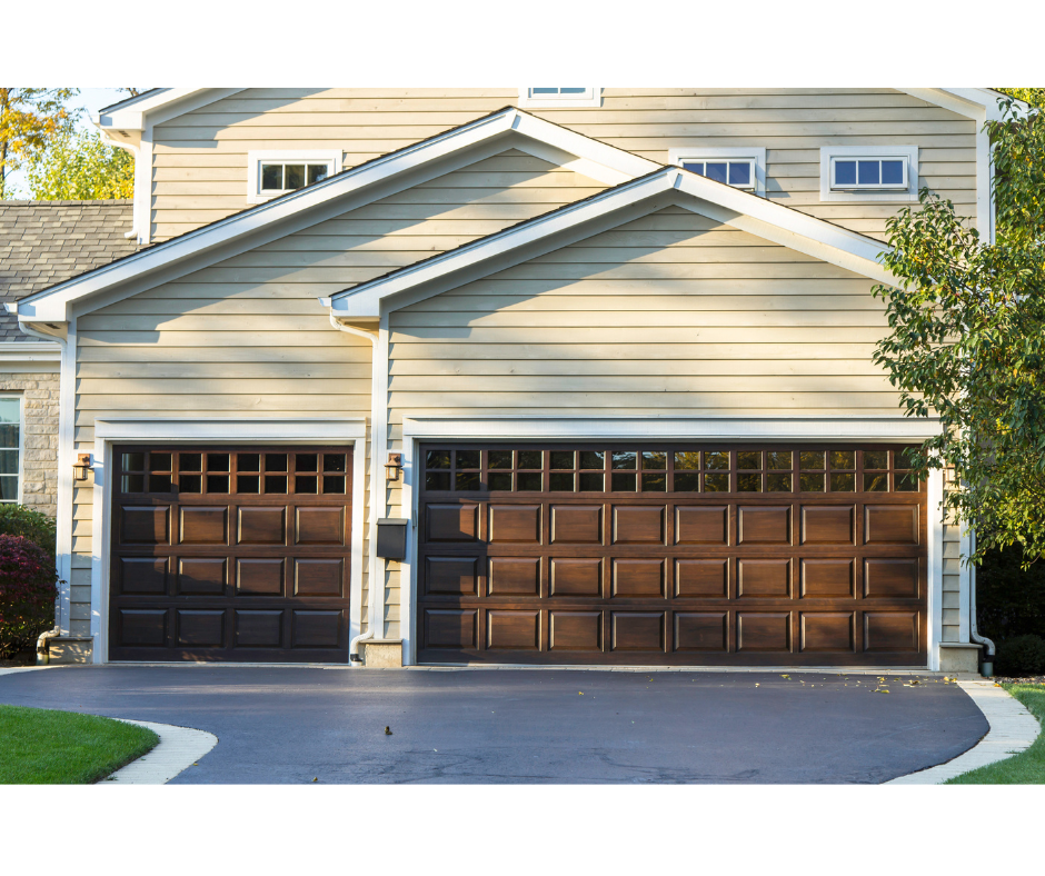 A home with a three-car garage with two garage doors